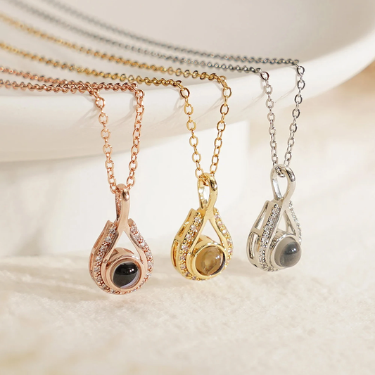LevNSoul memorial photo projection necklace in gold, rose gold, and silver tones