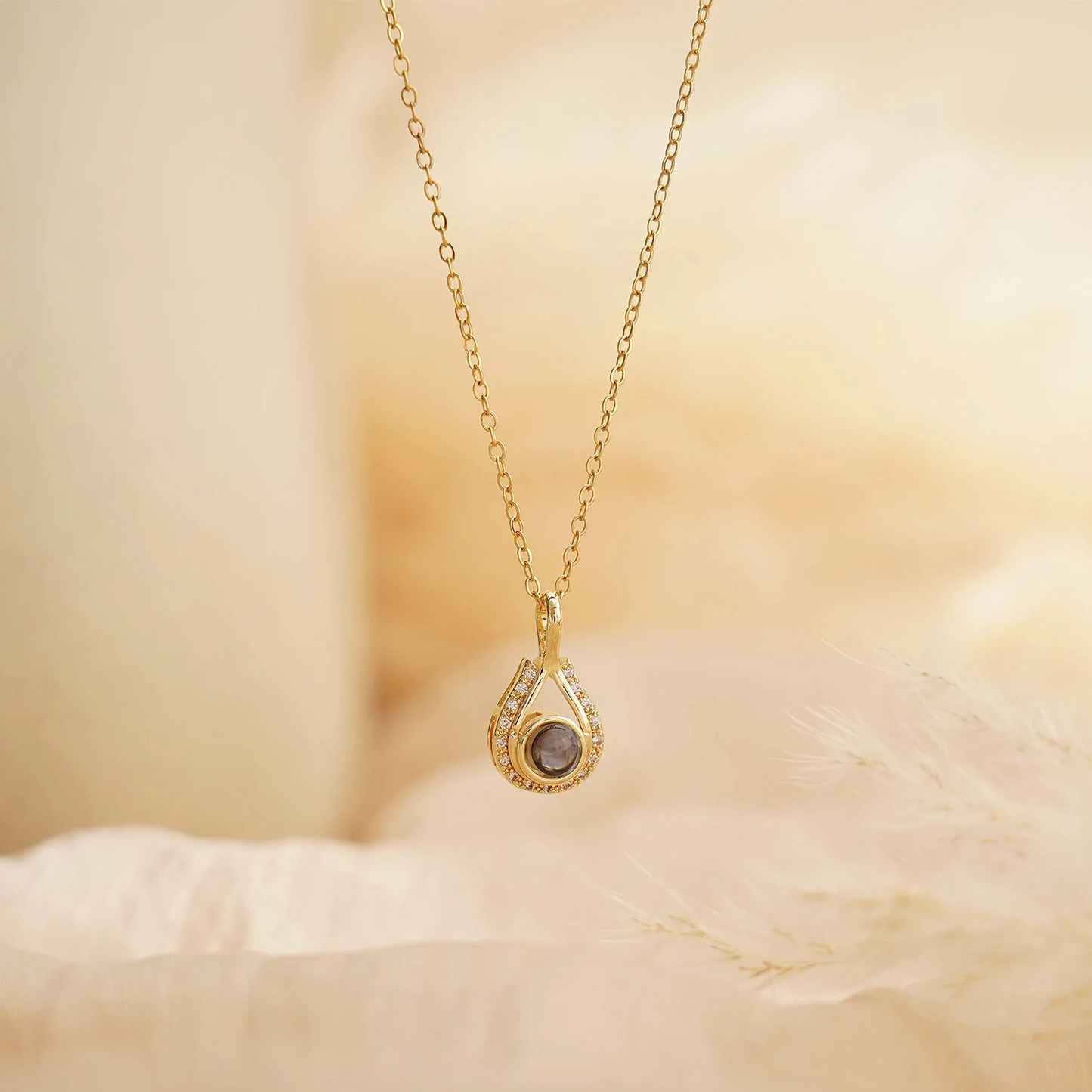 LevNSoul gold-tone memorial photo projection necklace, pendant detail