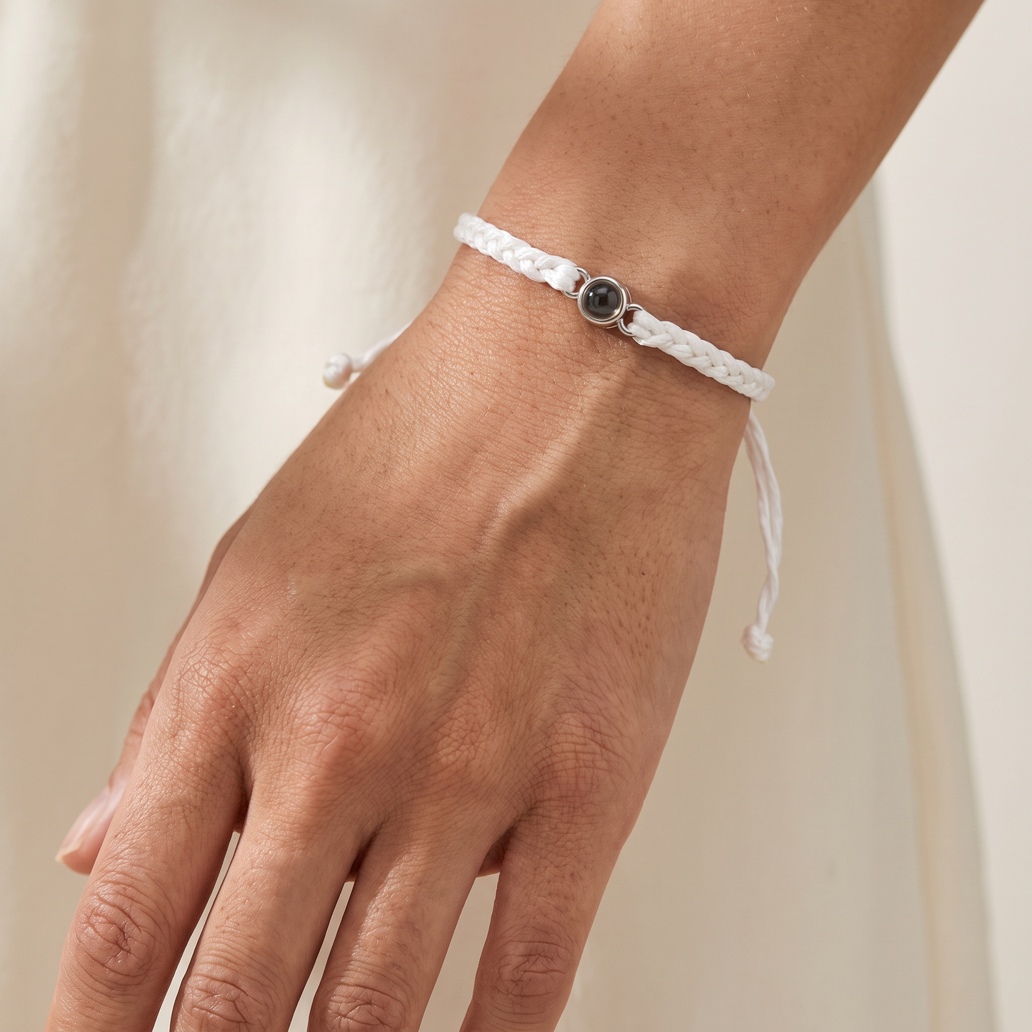 Woven cord photo projection bracelet